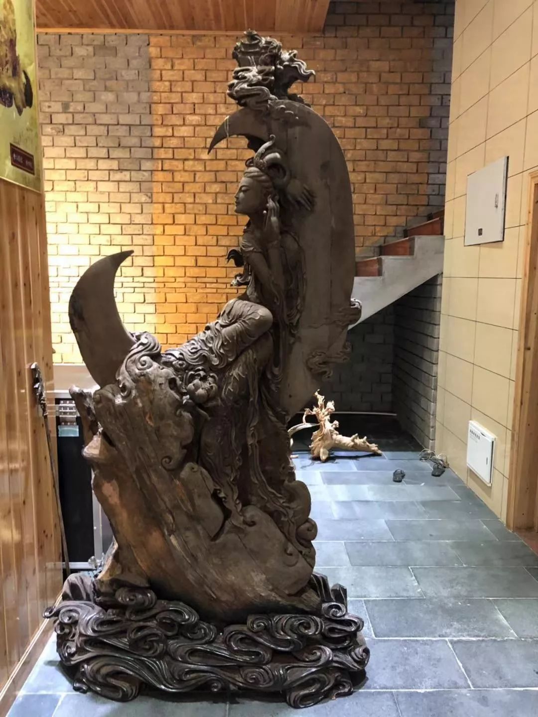 A magnificent and extremely rare large painted wood standing